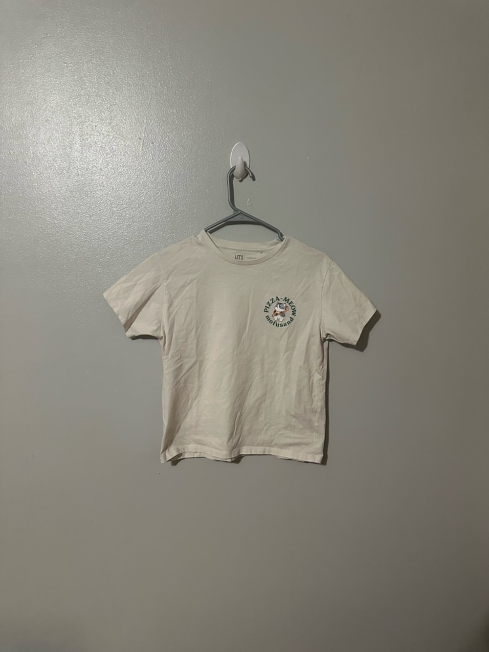Uniqlo Kids Short Sleeve Tee in Cream with Green Logo